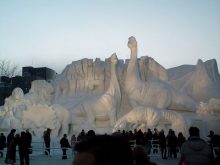 giant dinosaur snow statue at sapporo snow festival